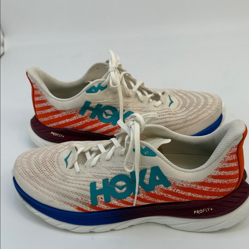 Hoka Cream‎ and Blue Athletic Shoes